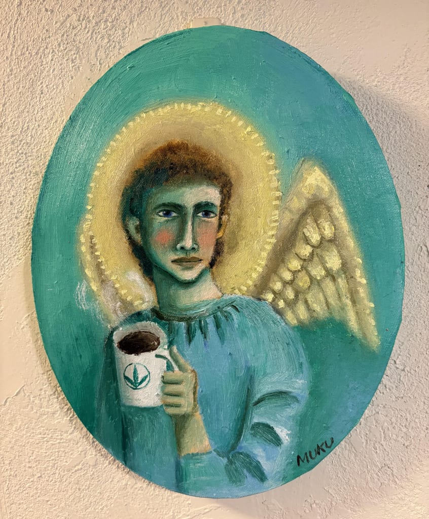 コーヒーを飲む天使